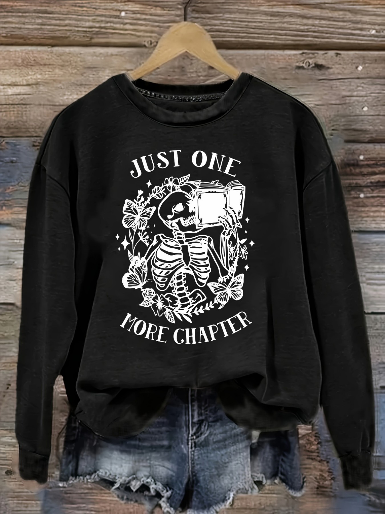 Winter Clothing Usa - เสื้อยืดแขนยาวคอกลมลำลองสำหรับผู้หญิง ลายโครงกระดูก 